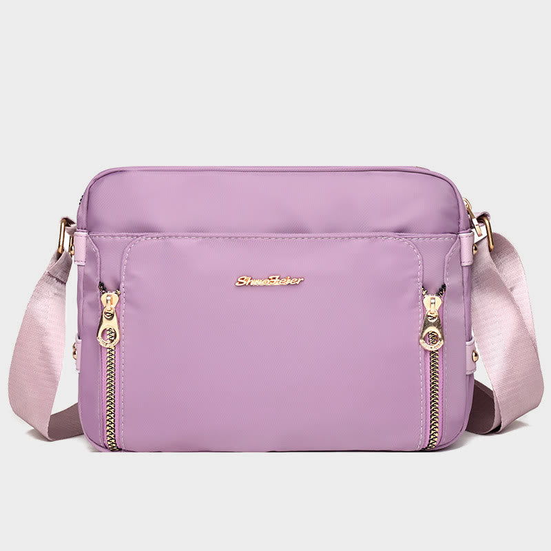 Plum waterproof nylon crossbody bag for women with adjustable strap