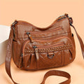 Women's leather bag with multiple pockets