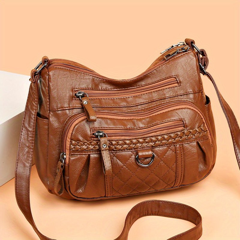 Women's leather bag with multiple pockets