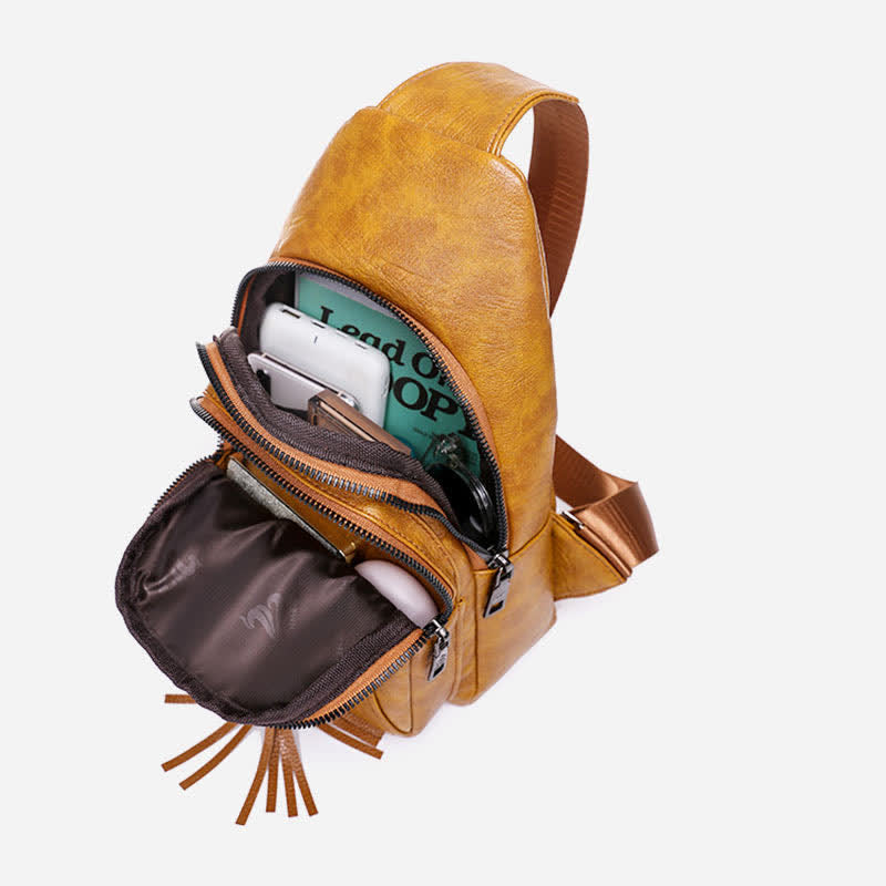 Camel brown PU leather sling bag open compartments with everyday items
