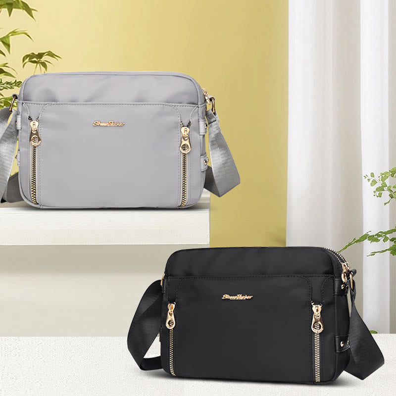 Light gray and black waterproof nylon crossbody bag color options