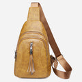 Camel brown PU leather sling bag back view with adjustable strap