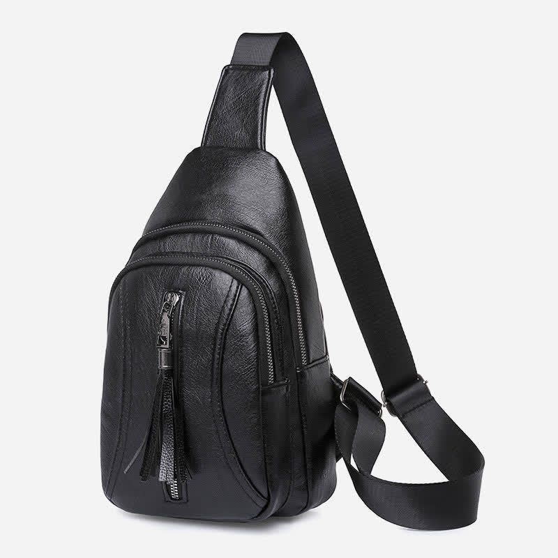 Black PU leather sling bag for women with adjustable strap