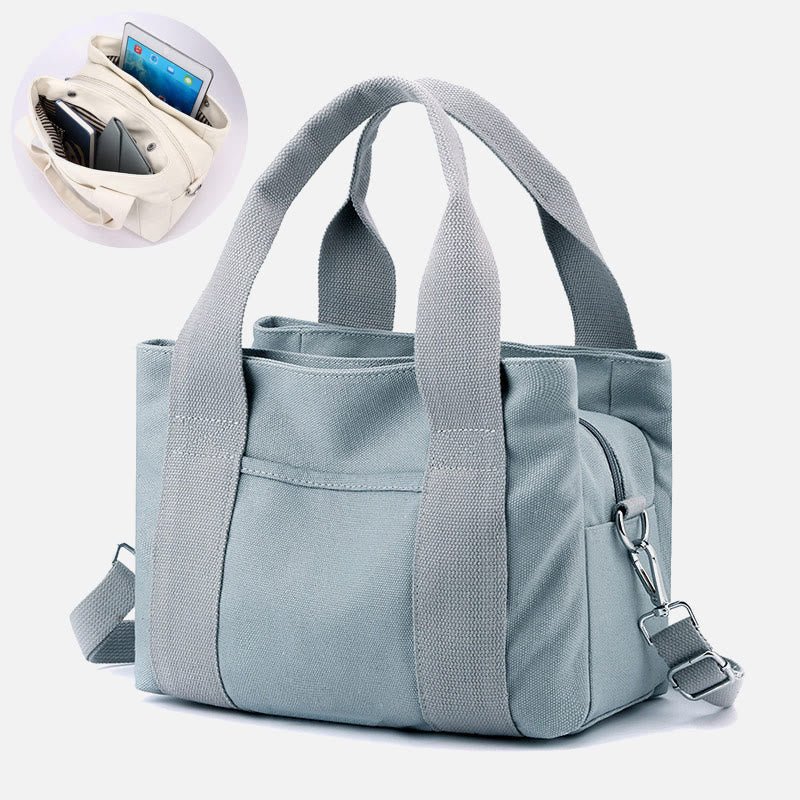 Solid color triple compartment canvas crossbody tote bag