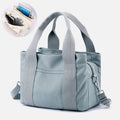 Solid color triple compartment canvas crossbody tote bag
