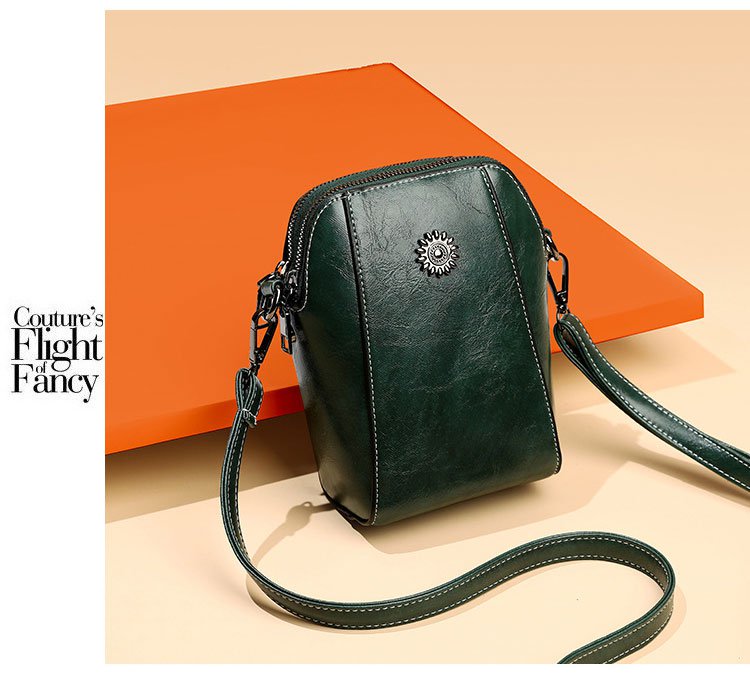 French shell shoulder bag, perfect for many styles.