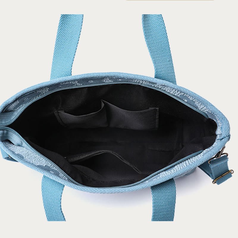 Floral printed canvas crossbody handbag