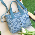 Floral printed canvas crossbody handbag
