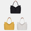 Black, yellow, and white large canvas tote color options