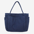 Navy blue canvas tote bag with canvas handles and zipper closure
