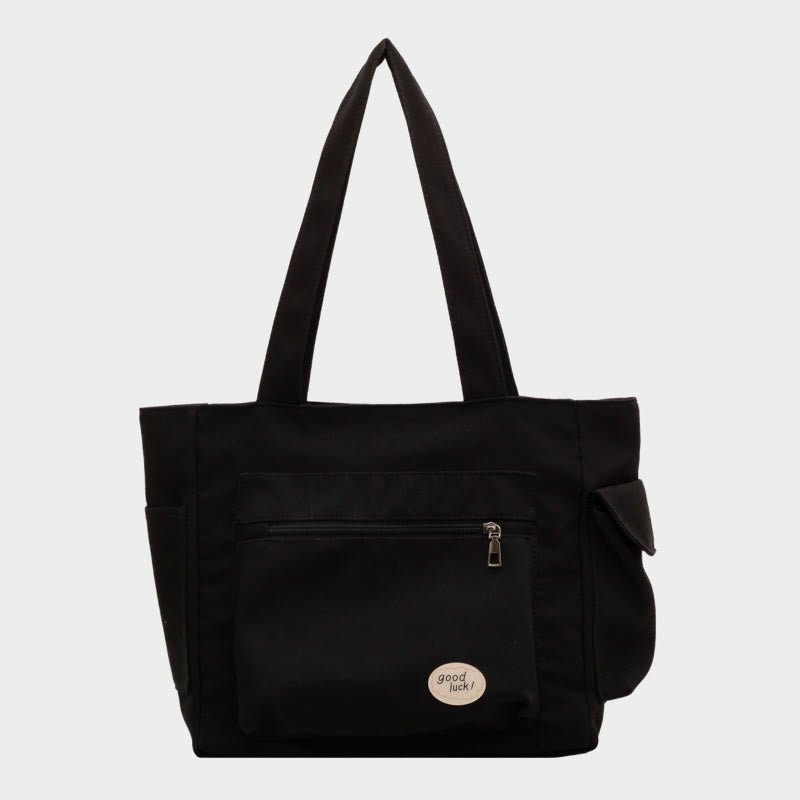 Black canvas tote bag for women with zipper and pockets