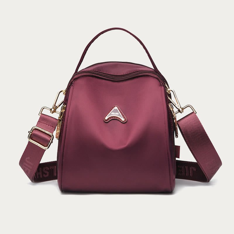 Magenta wide-strap nylon crossbody bag for women