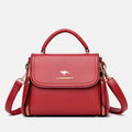Women's medium double compartment leather satchel handbag