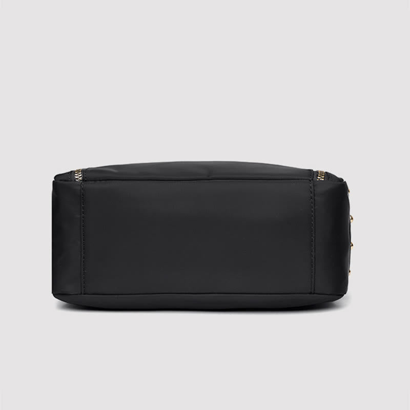 Black waterproof nylon crossbody bag bottom view