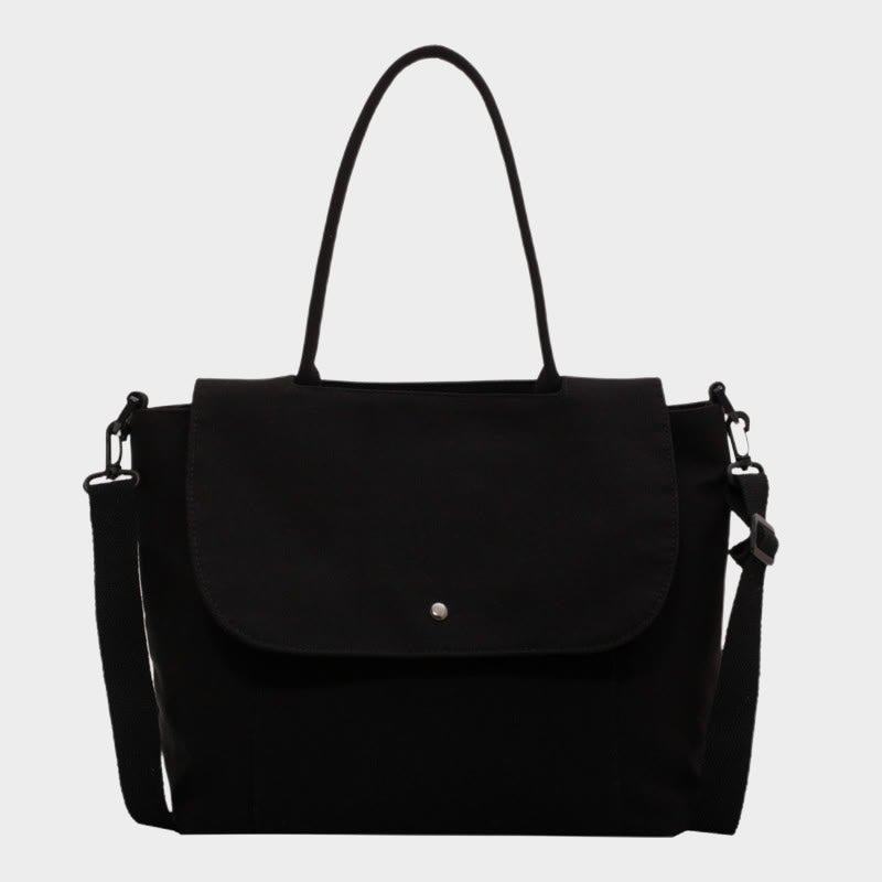 Black large canvas tote bag with zipper and adjustable strap