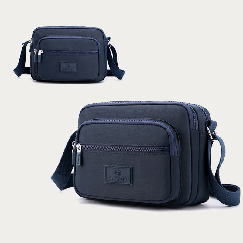 Navy blue four-zip lightweight nylon crossbody bag for women