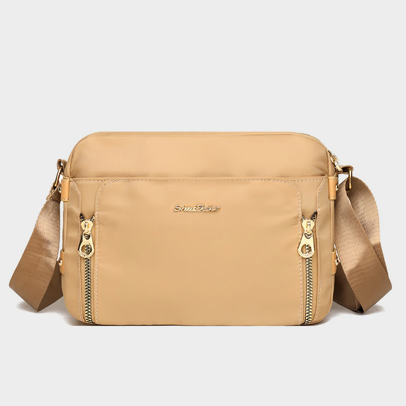 Cream waterproof nylon crossbody bag for women with adjustable strap