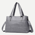Women's triple compartment leather tote handbag