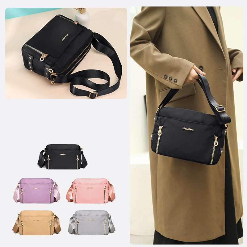 Black waterproof nylon crossbody bag worn with five color options shown