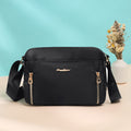 Black waterproof nylon crossbody bag front view