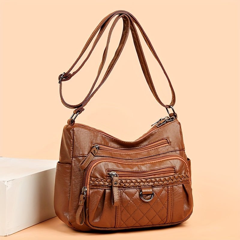 Women's leather bag with multiple pockets