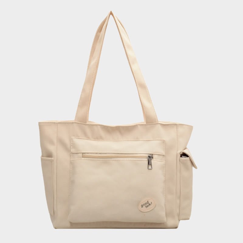 Ivory canvas tote bag for women with zipper and pockets