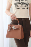 Golden brown Togo cowhide handbag