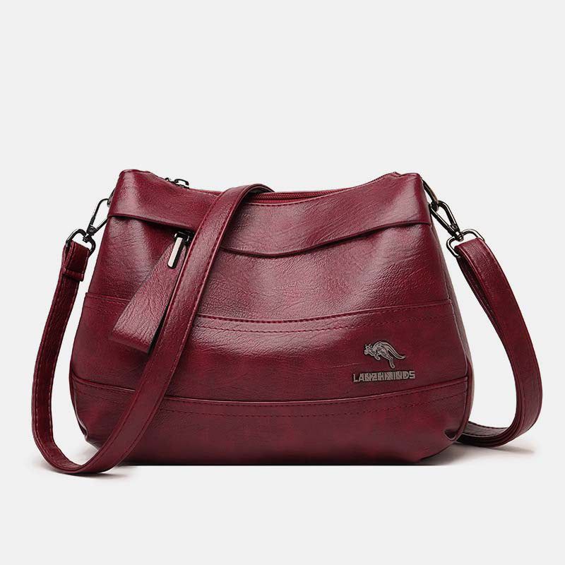 Women's triple compartment leather crossbody bag