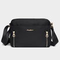 Black waterproof nylon crossbody bag for women with adjustable strap