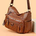 Women's leather bag with multiple pockets
