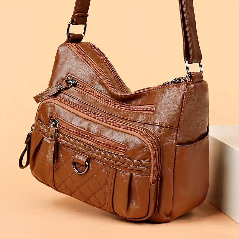 Women's leather bag with multiple pockets