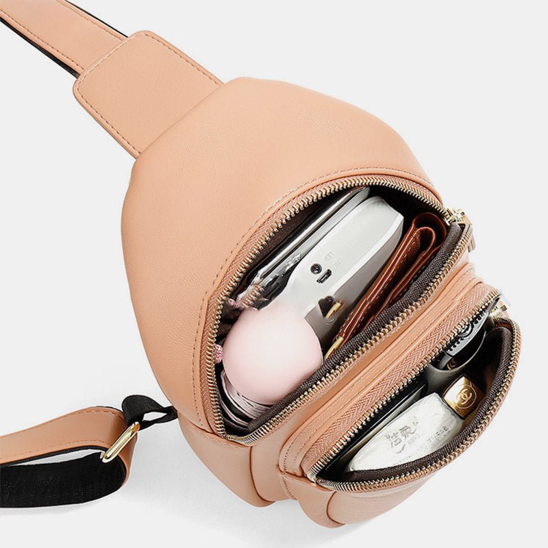 Women's small leather crossbody sling backpack
